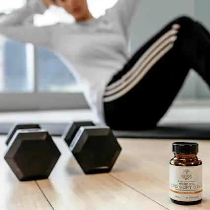 Weights and bottle of supplements
